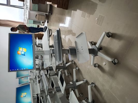 kopen Het regelbare van het de Computerwerkstation van het Hoogtebureau Geïntegreerde bewegende karretje Karretje online vervaardiging